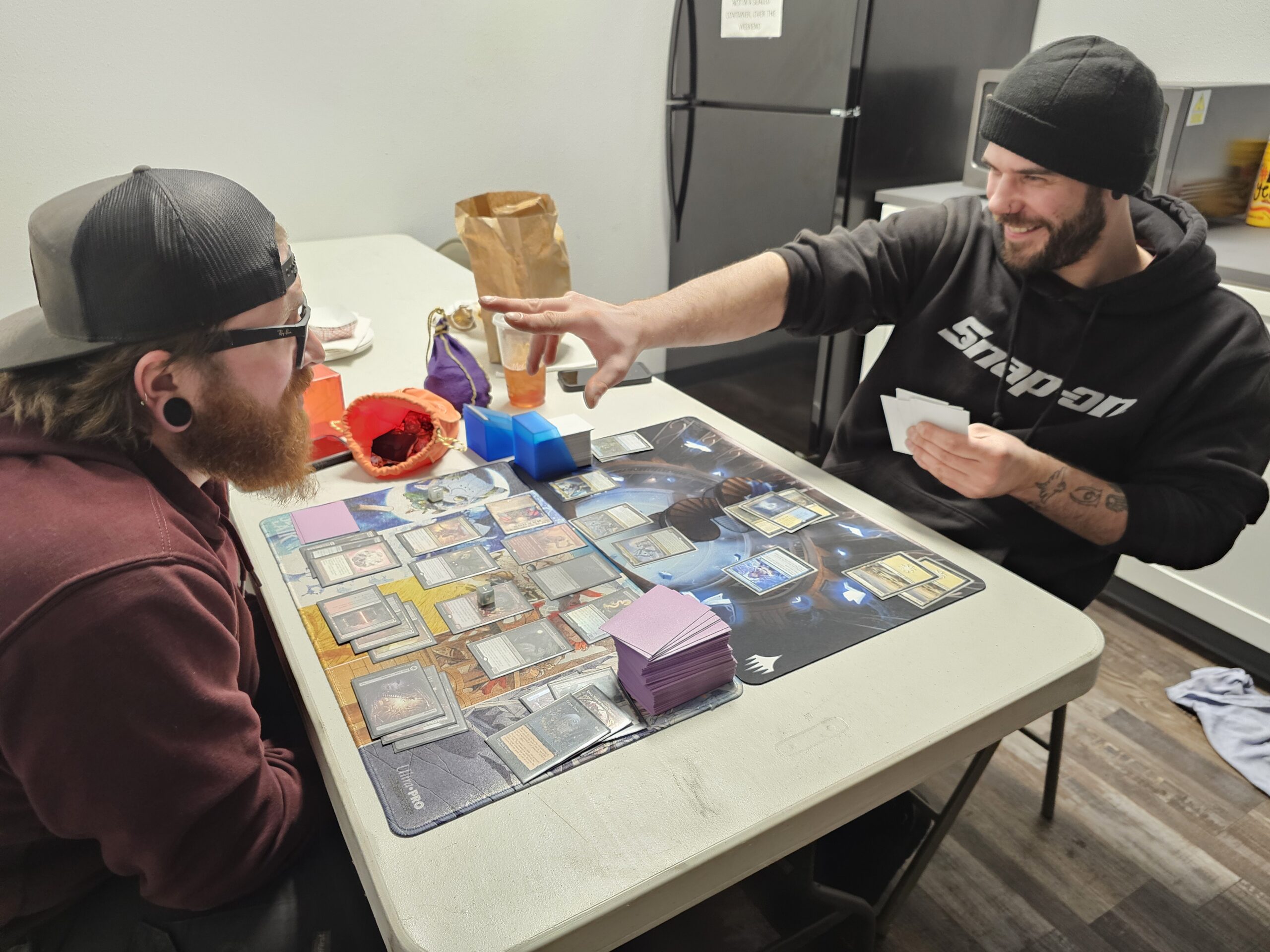 Rain and CJ playing Magic The Gathering - Cole Street Game Vault Regulars